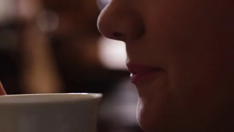 The girl drinks coffee Stock Footage 83093685