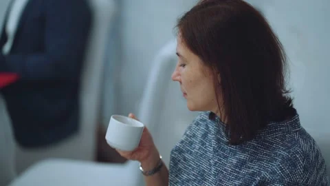 The girl drinks coffee Stock Footage 219966500