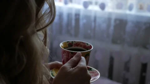 Girl drinks from a cup Stock-Footage 152653316