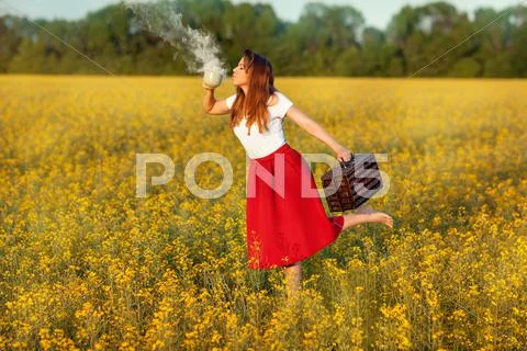 Girl drinks from a cup magic smoke. Stock Photos