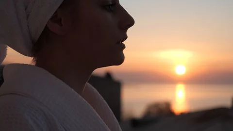 The girl drinks at dawn Video stock 106344138