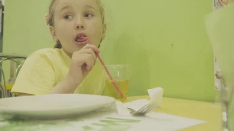 The girl drinks juice Stock Footage
