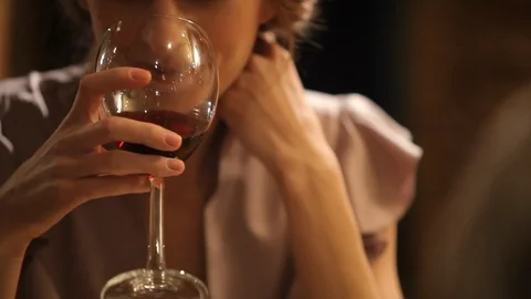 Girl drinks wine Stock Footage 100242583