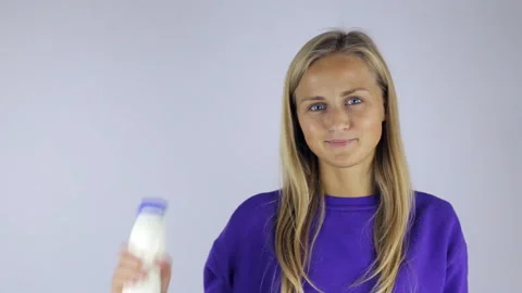 Girl drinks yoghurt Stock Footage 95464506
