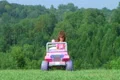 Girl Driving Toy Jeep Footage