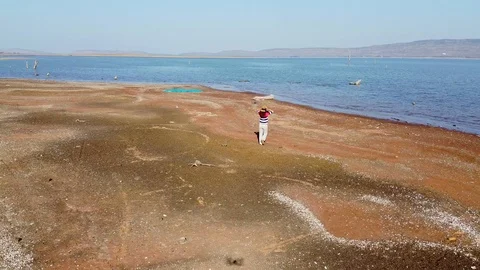 The girl in the drone's view resting Stock Footage 122531789
