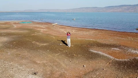 The girl in the drone's view resting Stock Footage 122531846