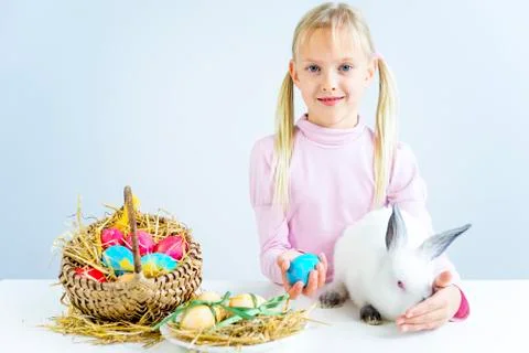 Girl with easter bunny Stock Photos