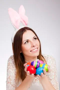 Girl with easter eggs Stock Photos