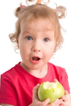Girl eats an apple Foto stock