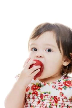 Girl eats apple Stock Photos