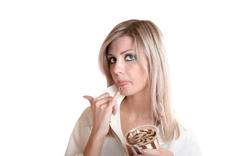 The girl eats chocolate paste Stock Photos