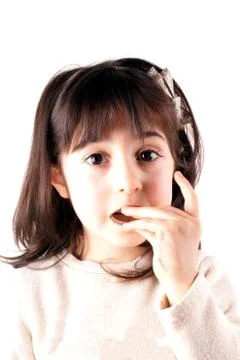Girl eats chocolate Stock Photos