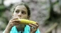 Girl eats corn HD Footage