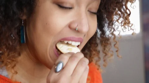 Girl Eats Cracker And Smiles Stock Footage 87854255