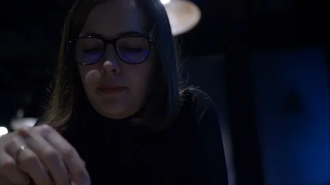 Girl eats dessert in a cafe. Black background Stock Footage 97304859