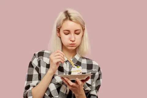 Girl eats dessert Foto stock