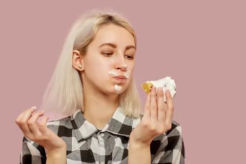 Girl eats dessert Photos