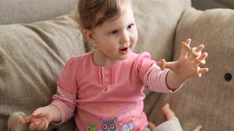 The girl eats drying Stock Footage 73813247