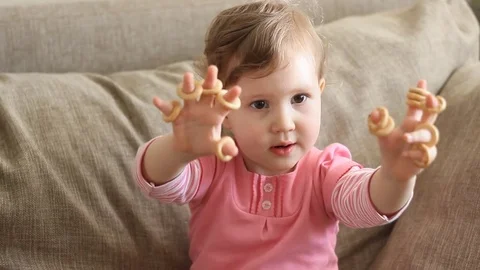 The girl eats drying Stock Footage 73813329