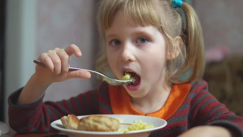 Girl eats food, closeup Stock Footage 101349621
