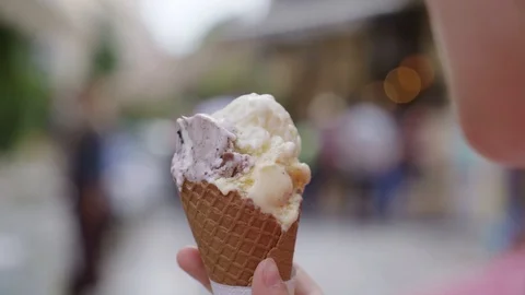 A girl eats an ice cream. Stock Footage 91804502