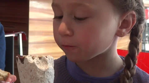 Girl eats icecream 스톡 동영상 22560290