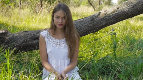 Girl eats a peach Stock Footage 40605426