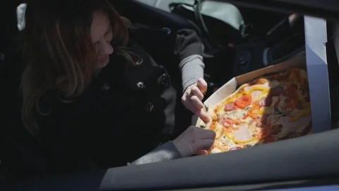 Girl eats pizza machine Video stock 89126396