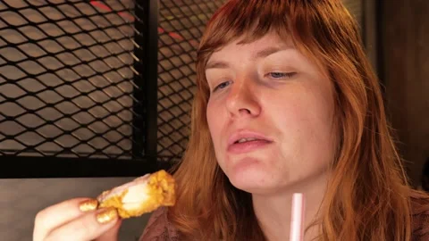 Girl eats in a restaurant. close-up Stock Footage 172432701