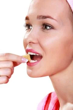 Girl eats sweets Stock Photos