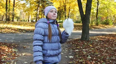 Girl Eats Tasty Candy Floss Stock Footage 8973786