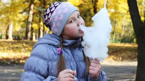 Girl Eats Tasty Candy Floss Video stock 8973804