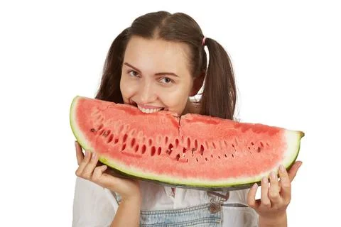 Girl eats watermelon Foto stock
