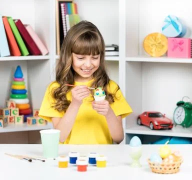 Girl with eggs for easter Stock Photos