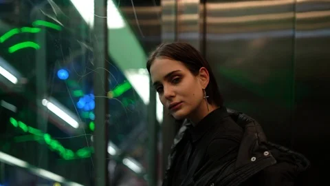 Girl In Elevator With Glass Window Stock-Footage 101810742
