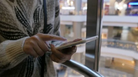 Girl elevator smarfone Stock Footage 72234608