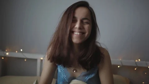 The girl is embarrassed while she is being filmed Stock Footage 103150696