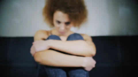 The girl embraces herself and silently cries Video stock 59238243