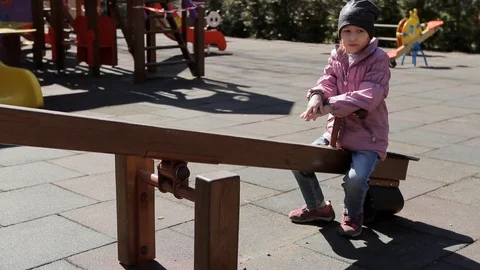 Girl on an empty playground Stock Footage 128180166