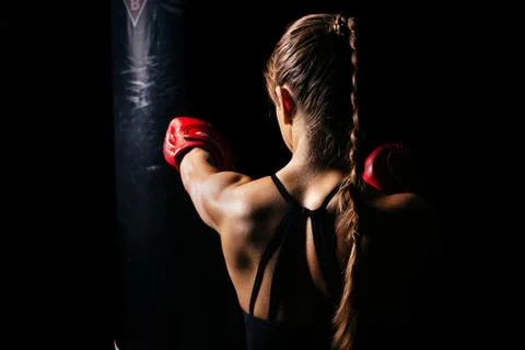 The girl is engaged in boxing Stock Photos