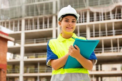Girl engineer checking work process Stock Photos