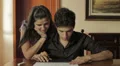 girl enjoys helping her boyfriend to do a project - lover - laugh - kiss HD Footage