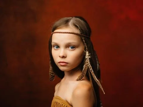Girl with ethnic hairstyle native american apache red background Stock Photos