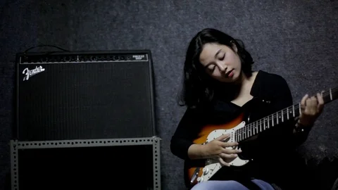 Girl Exercise Guitar Stock Footage 107404571