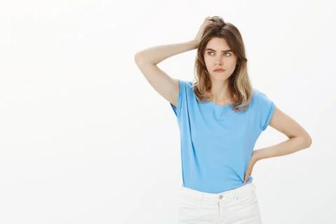 Girl facing problem, thinking how solve it. Focused troubled attractive young Stock Photos