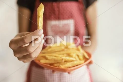 Girl with fast food isolated on white Stock Photos
