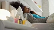 Girl With Fever Using Thermometer Calls Doctor By Phone Stock Footage