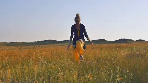 Girl is on the field Stock Footage 85539991
