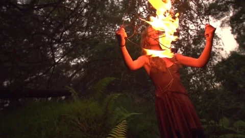 Girl Fire Dancing in the Forest Stock Footage 82352503
